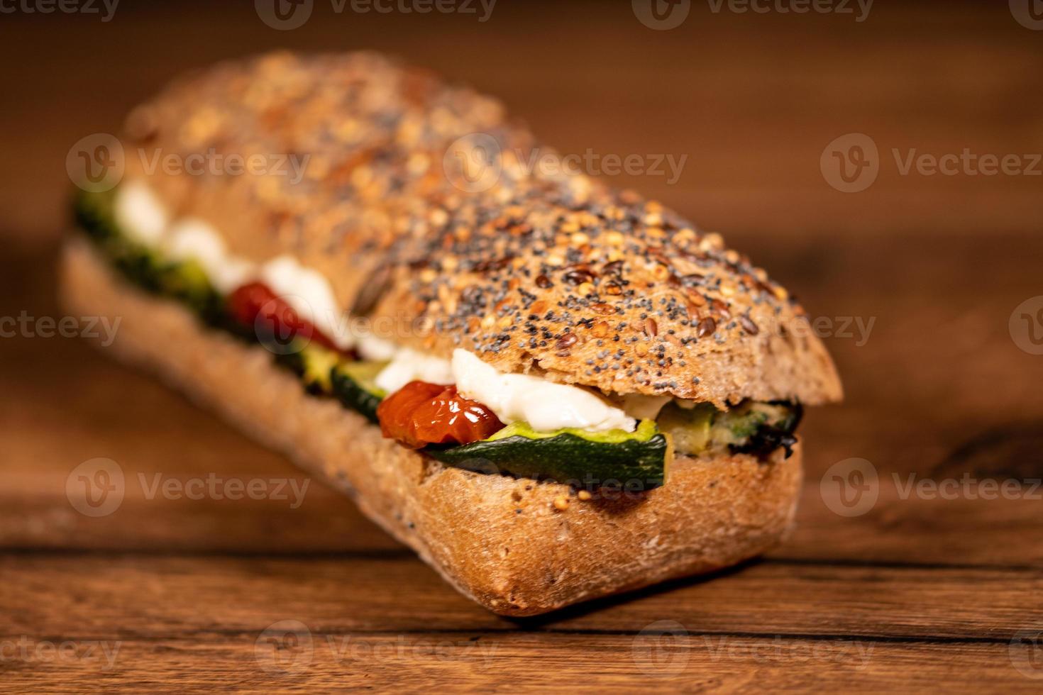 sandwich with salami and vegetables photo