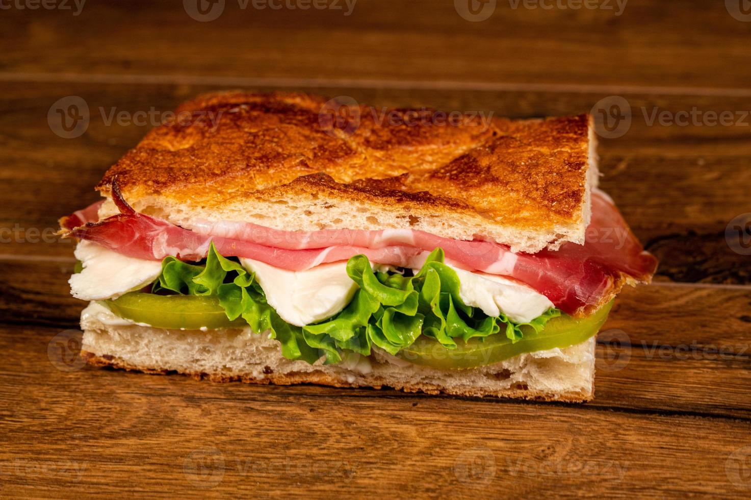 stuffed focaccia with cold cuts and vegetables photo