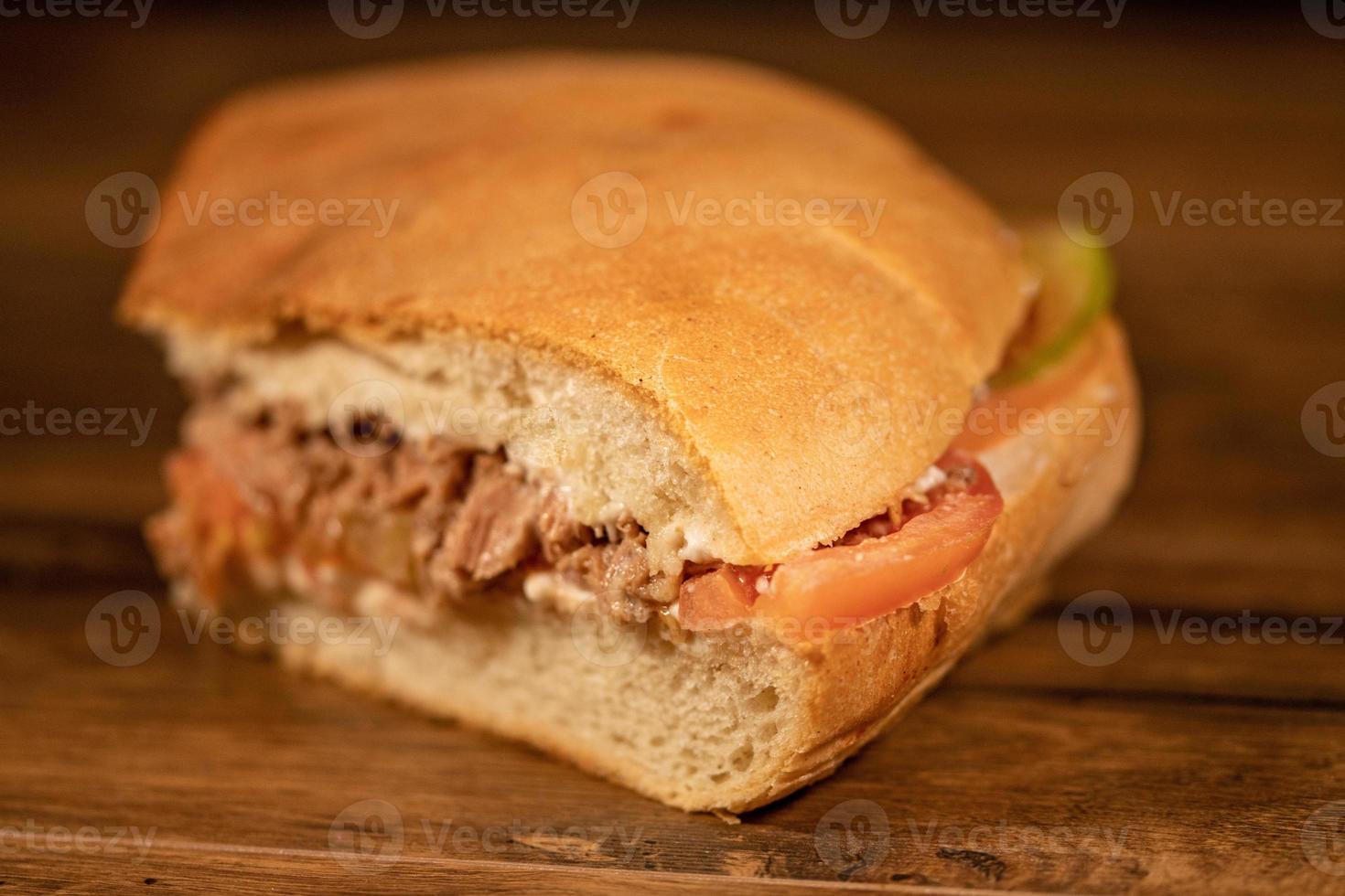 sandwich with salami and vegetables photo