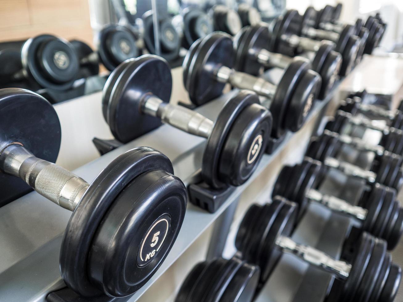 Dumbell set left on the racks. photo