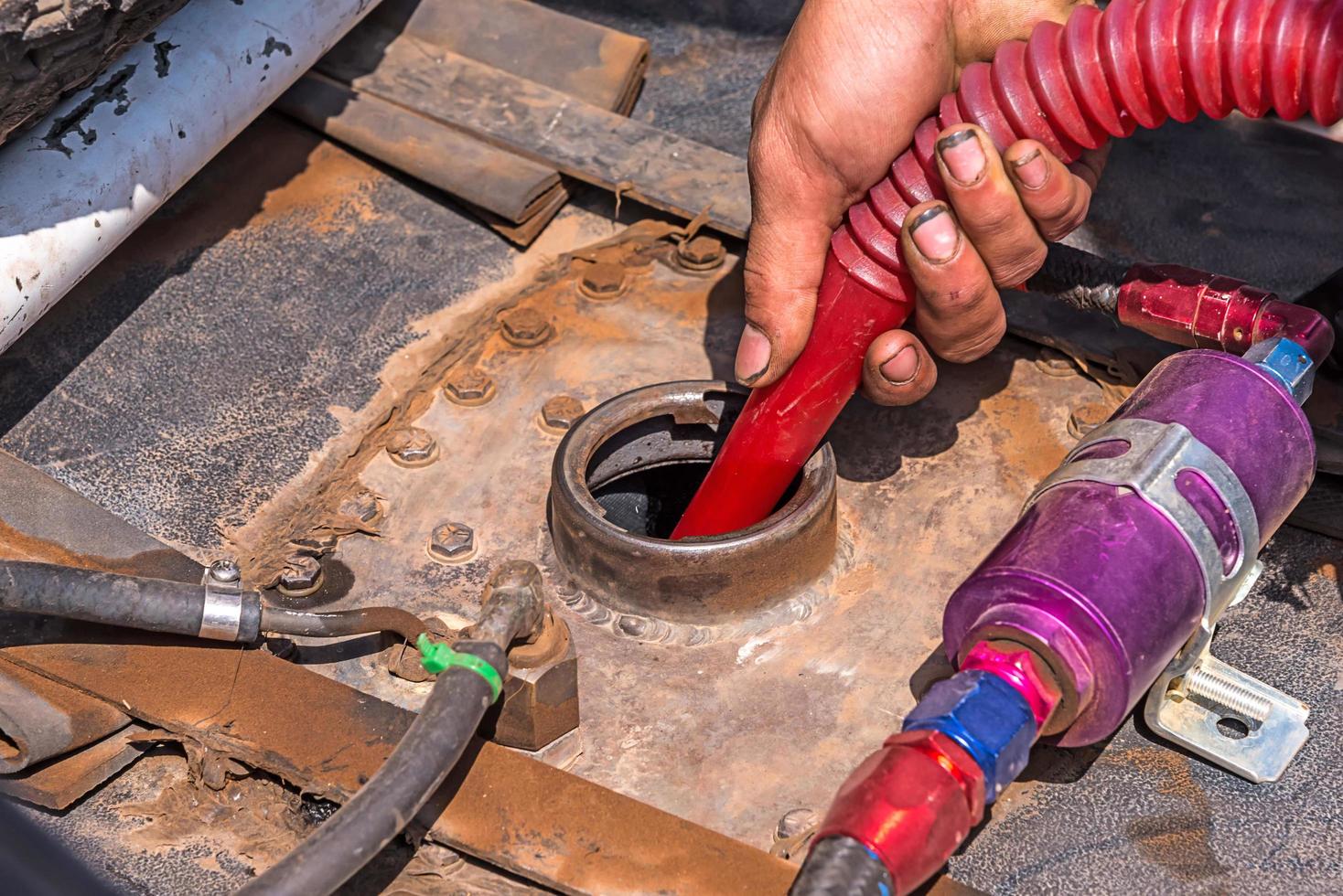 Pour fuel in car. photo