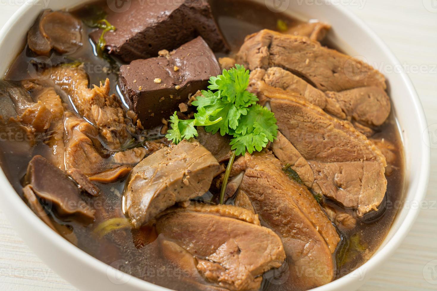 Pot-stewed ducks or Steamed duck with soy sauce and spices photo