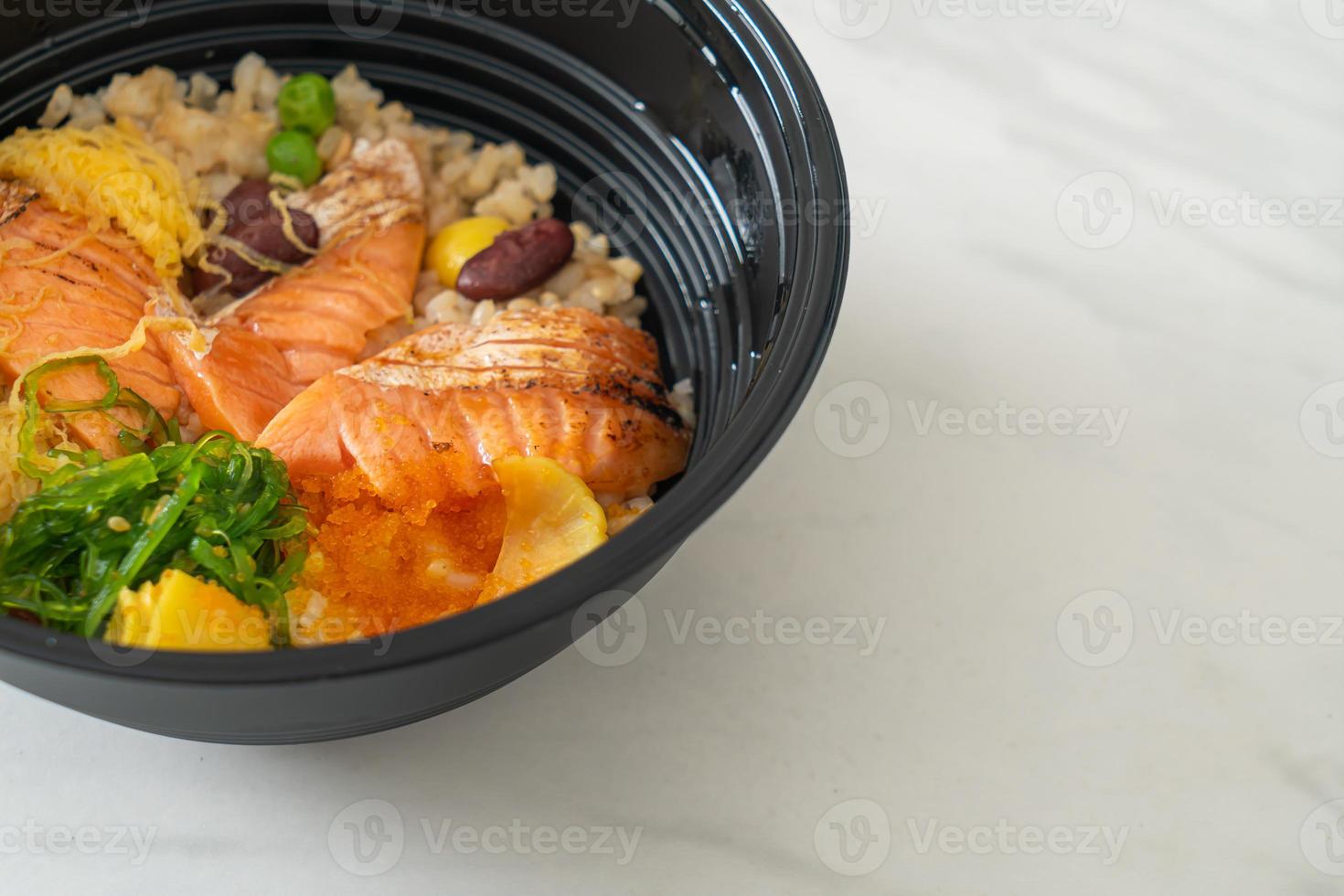 grilled salmon with brown rice donburi photo