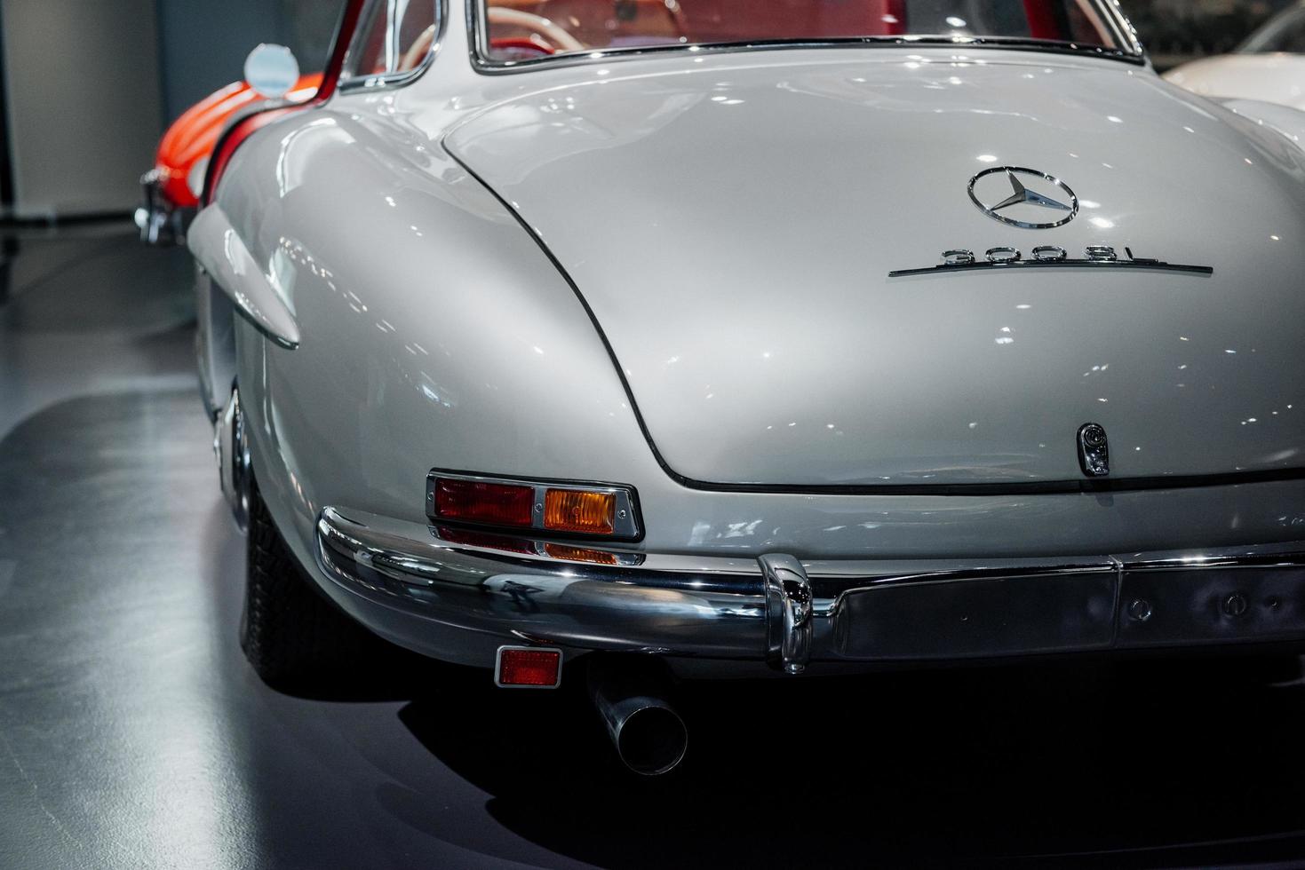 STUTTGART, GERMANY - OCTOBER 16, 2018 Mercedes Museum. Looks like brand new. White historical expensive retro car standing on the stand photo