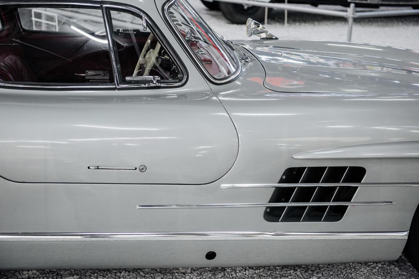 SINSHEIM, GERMANY - OCTOBER 16, 2018 Technik Museum. Right side of white vintage vehicle photo