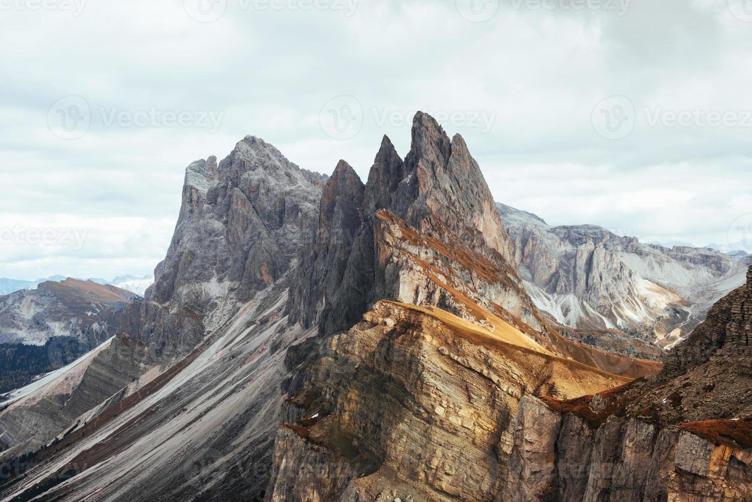 Dangerous slopes. Outstanding hills of the Seceda dolomite mountains at daytime photo