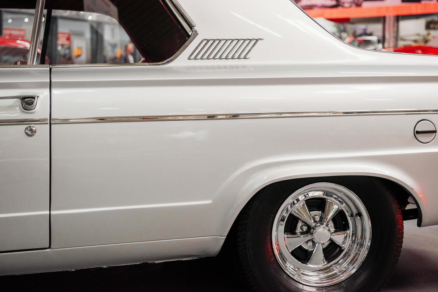 SINSHEIM, GERMANY - OCTOBER 16, 2018 Technik Museum. Cropped photo of the left side of the white rare car