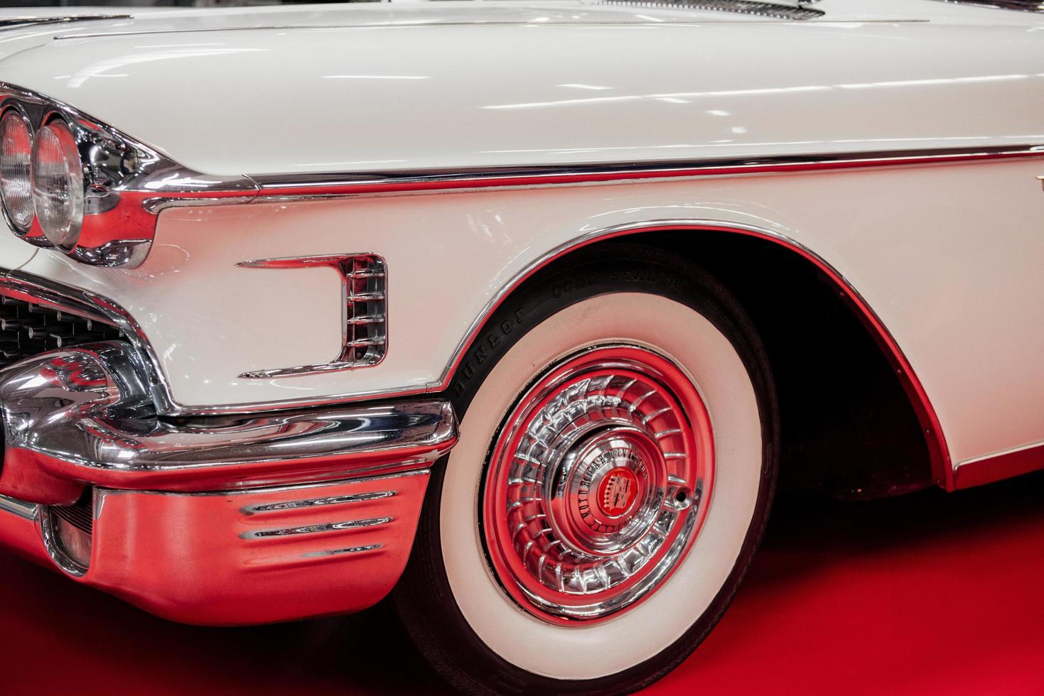 SINSHEIM, GERMANY - OCTOBER 16, 2018 Technik Museum. Captured from the side. White vintage polished car photo