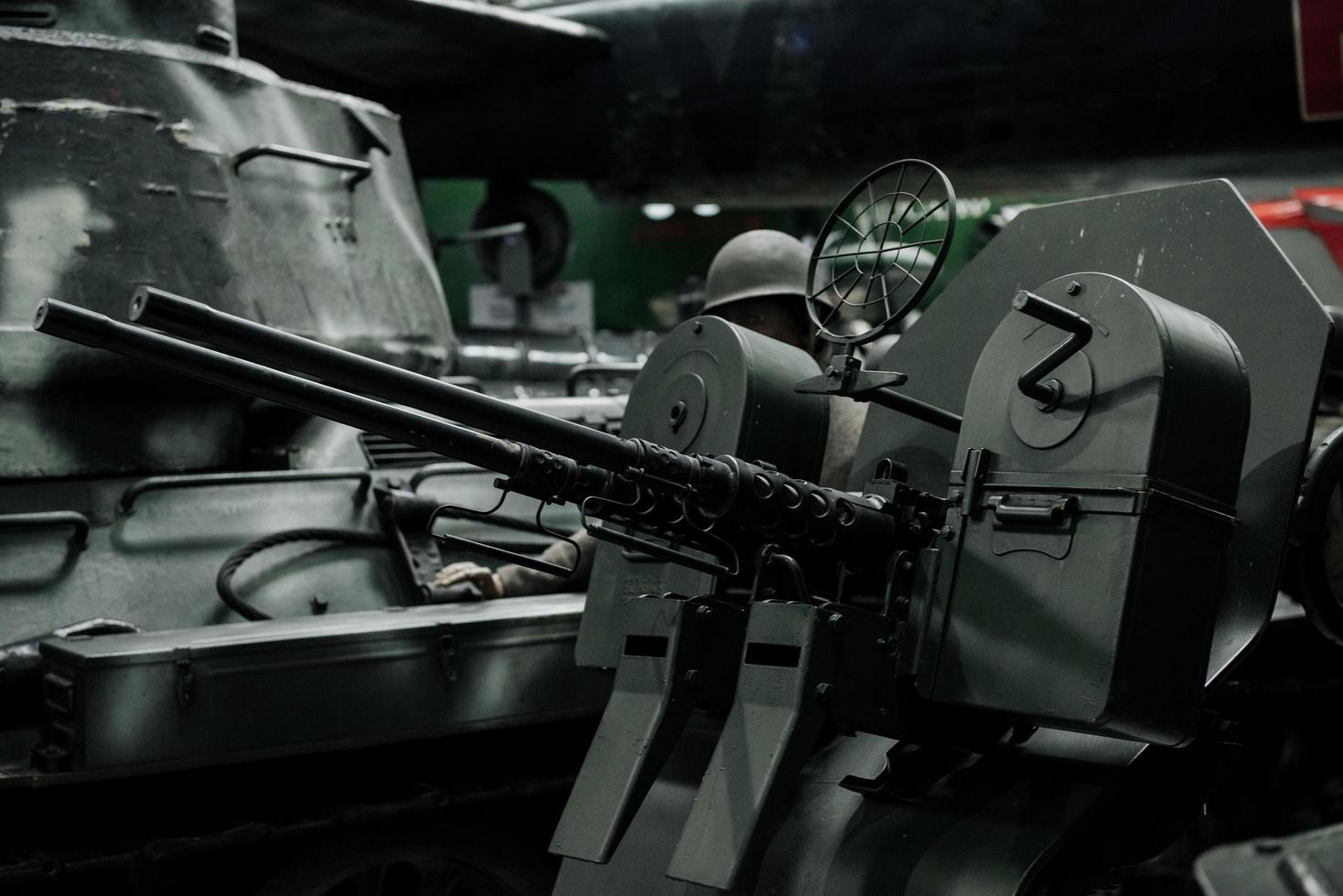SINSHEIM, GERMANY - OCTOBER 16, 2018 Technik Museum. Focus on the gun. Powerful old black tank at the exhibition photo
