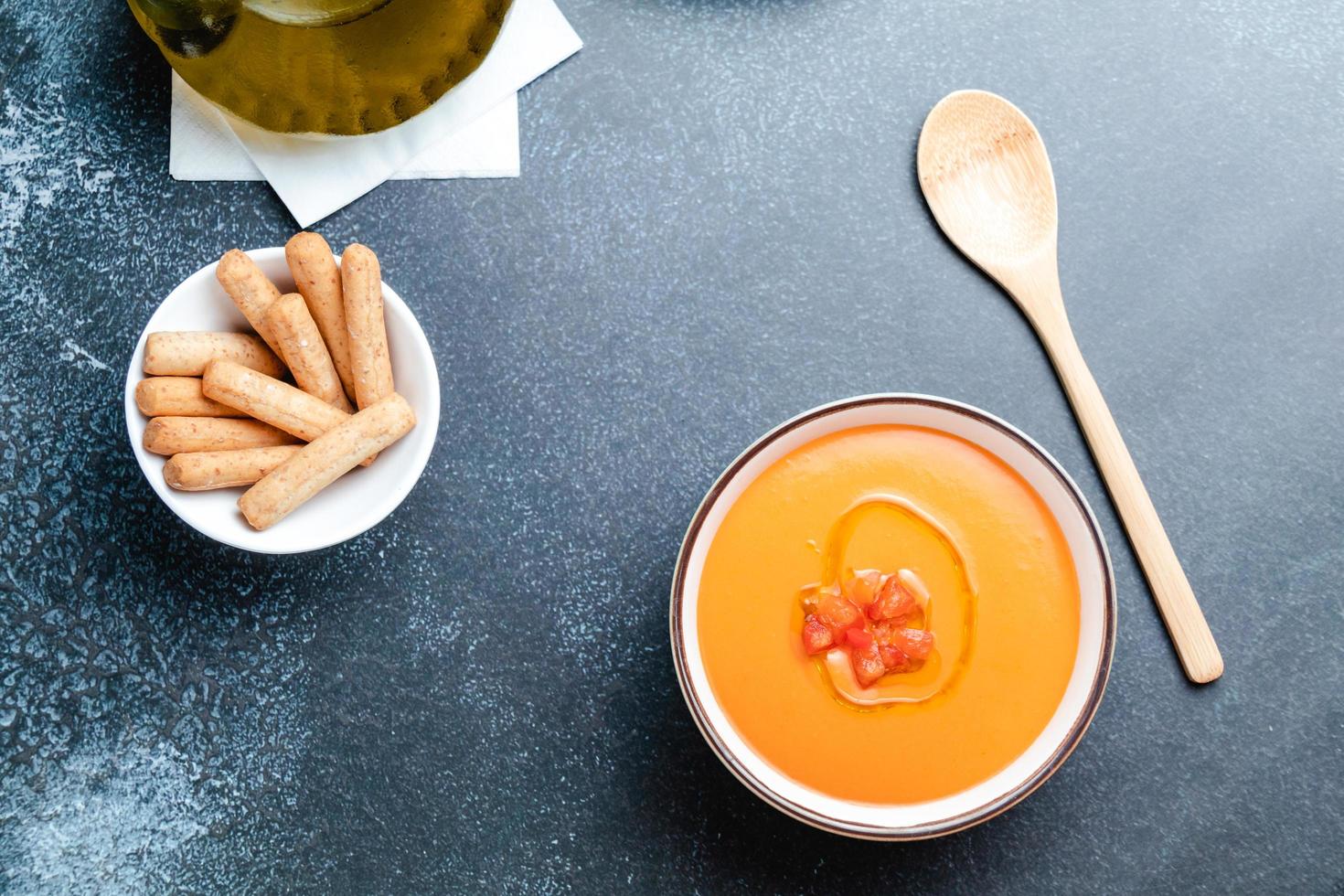 bowl with salmorejo, a typical spanish tomato soup similar to the gazpacho photo