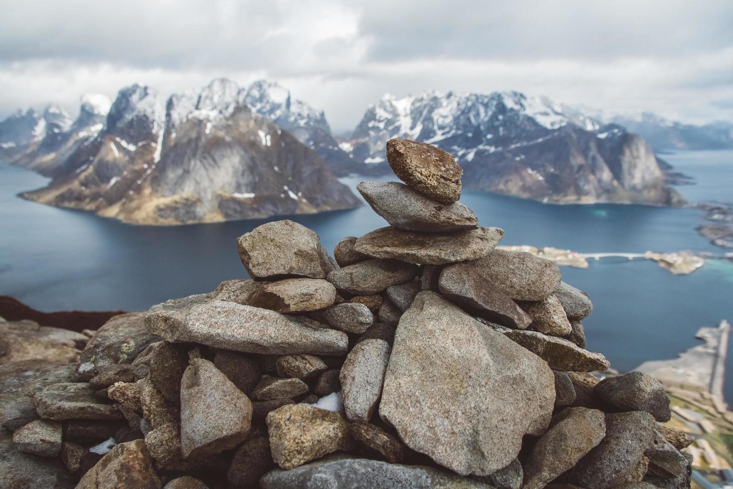 Scenic landscape of Lofoten islands peaks, lakes, and houses. Reine village, rorbu, reinbringen photo