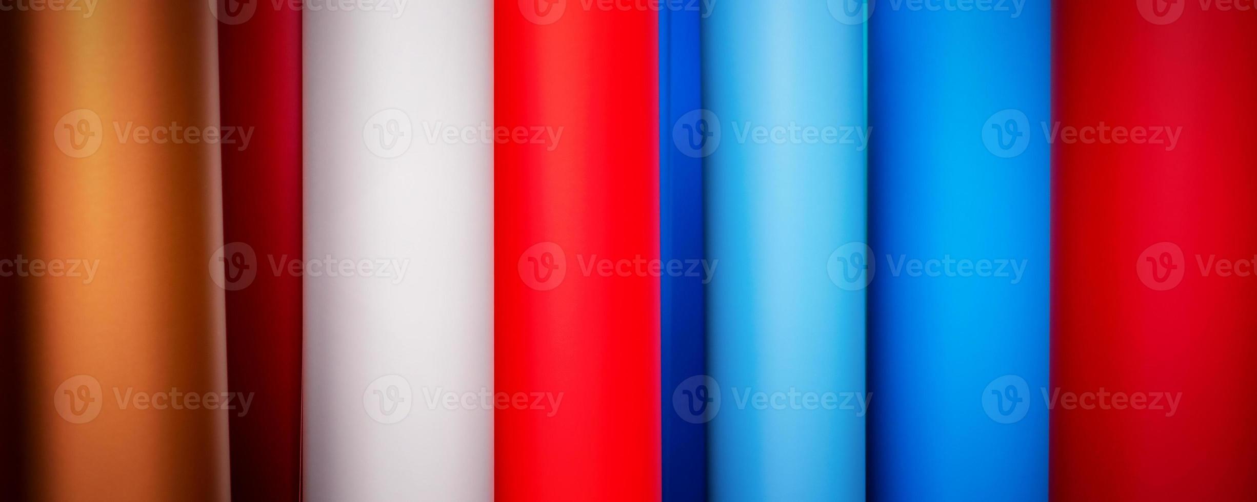 Vinyl self-adhesive film for advertising banners printing. Multi-colored roll. photo