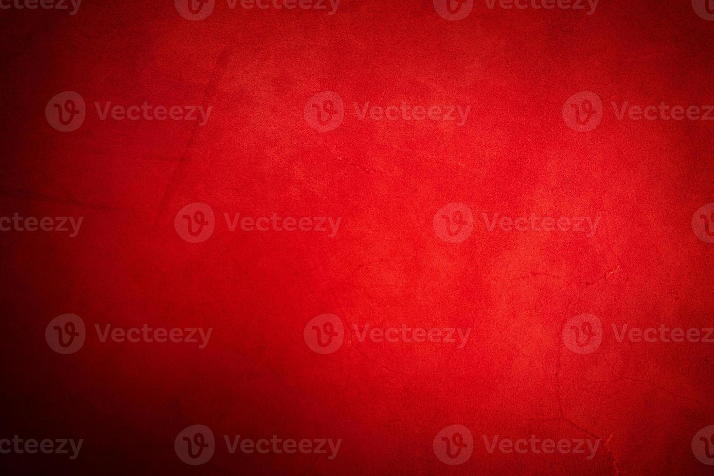 Red genuine leather as a background closeup. Horizontal photograph of a suede texture. photo