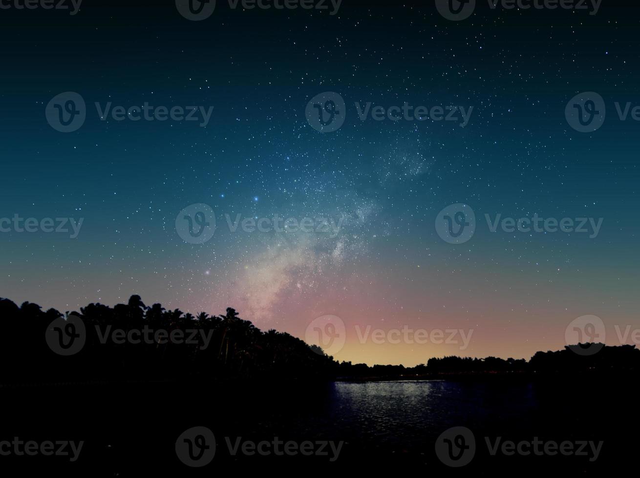 Beautiful evening landscape with milky way photo