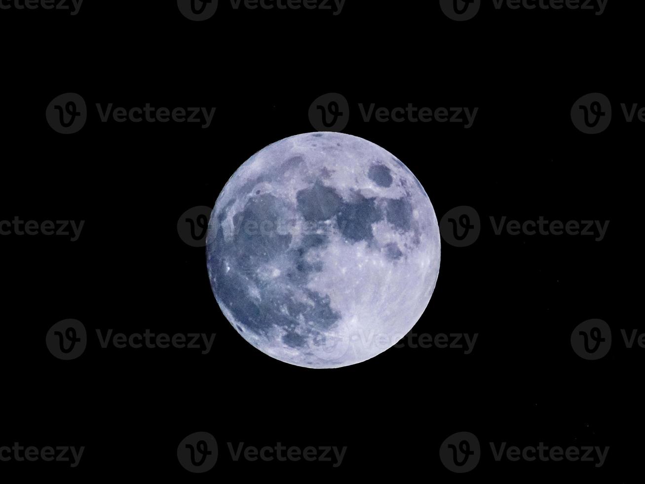 Full moon view in dark night sky photo