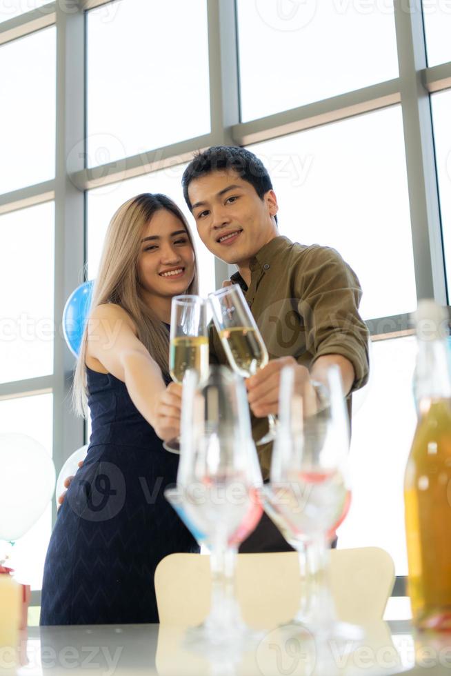 Young couple celebrating the new year with love for each other. photo