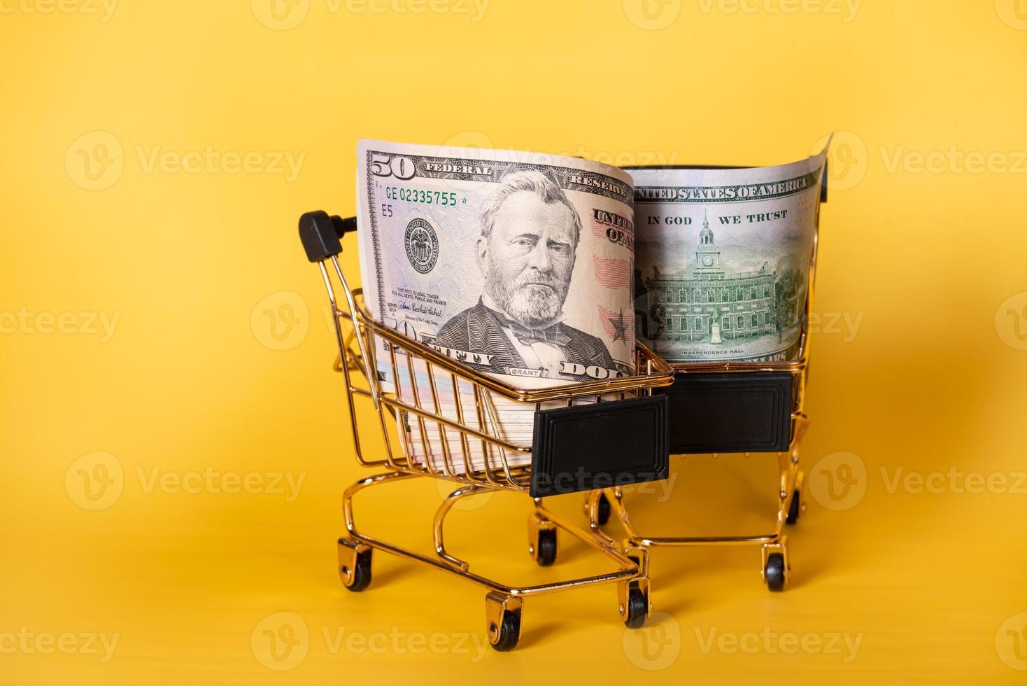 American banknotes dollars in a shopping cart. Shopping, discounts. photo