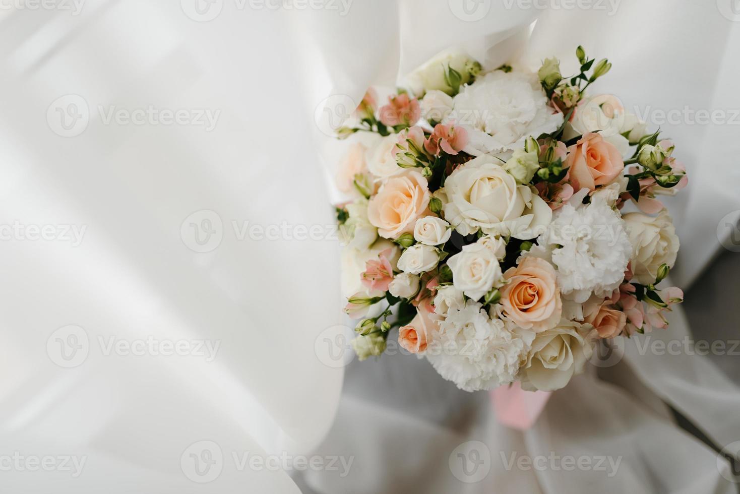 elegant wedding bouquet of fresh natural flowers photo