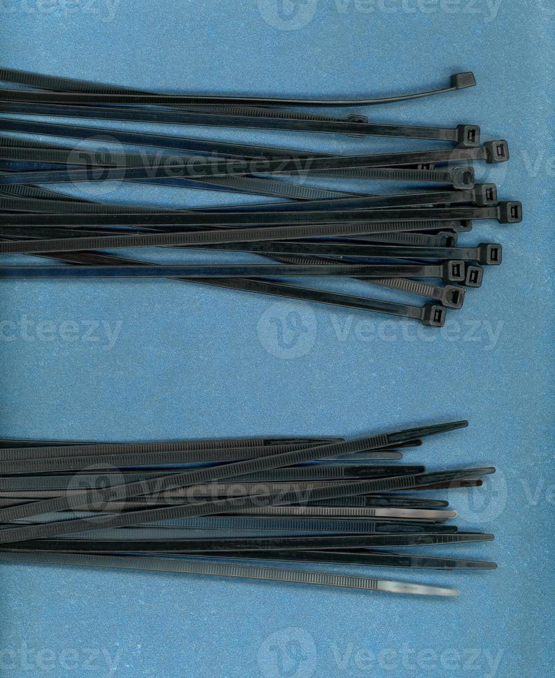 black cable tie aka hose ties or zip ties 4147017 Stock Photo at Vecteezy
