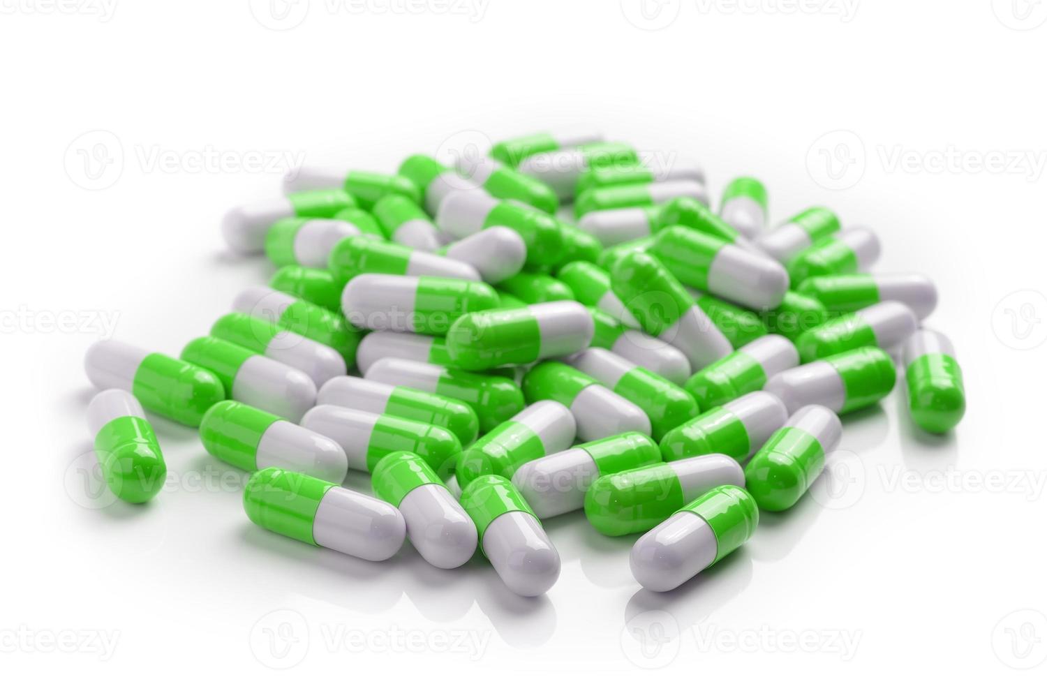 Cápsulas de píldoras sobre fondo blanco. foto