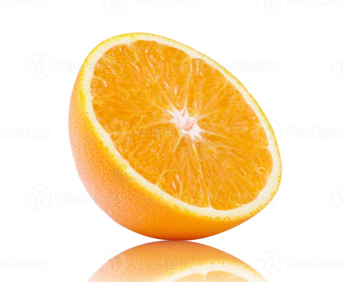 Half orange fruit on white background, fresh and juicy photo