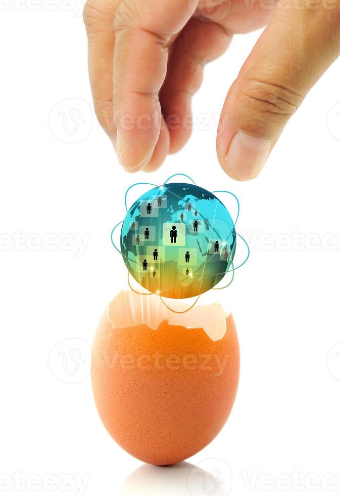 New world business concept with a glowing global egg photo