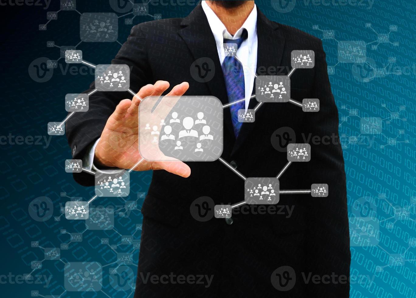 Businessman holding icon of social network photo