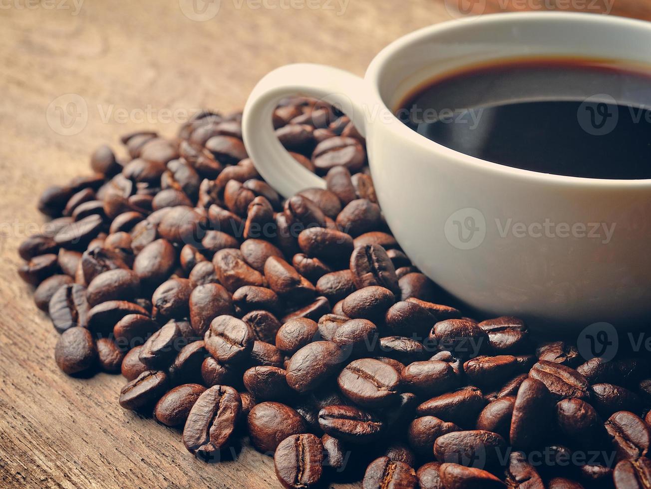 Coffee on grunge wooden background photo