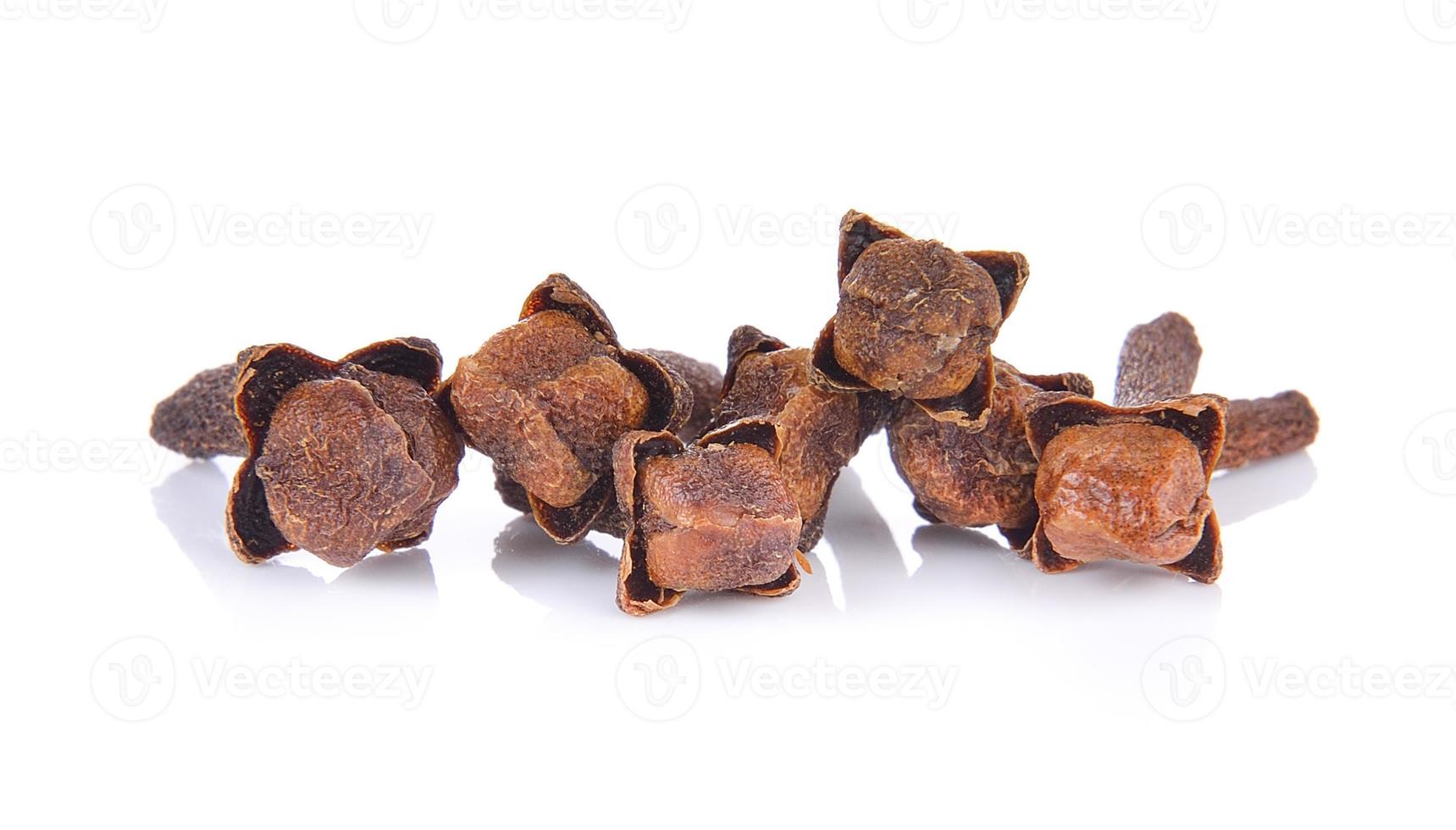 Spice cloves on white background photo