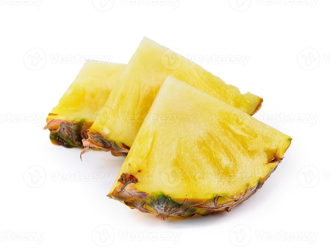 Pineapple slices isolated on white background photo