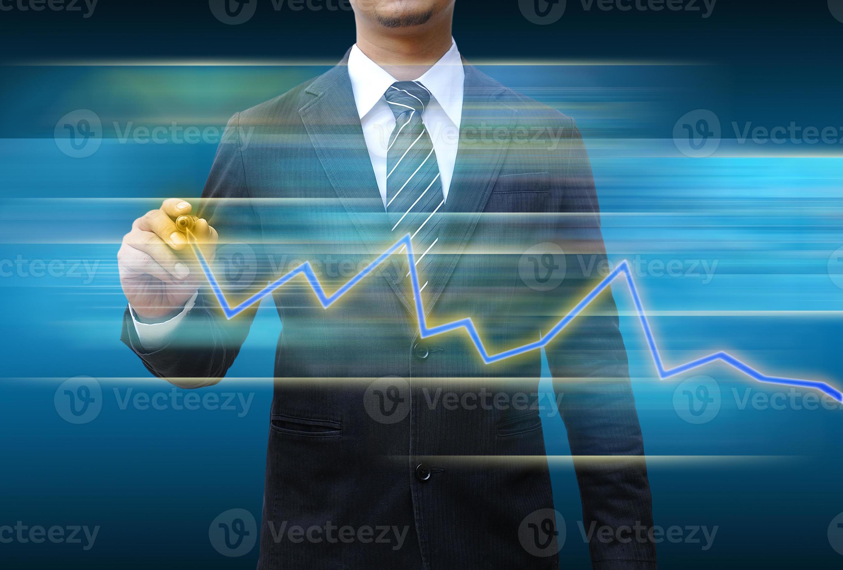 businessman hand drawing business graph 4158529 Stock Photo at Vecteezy