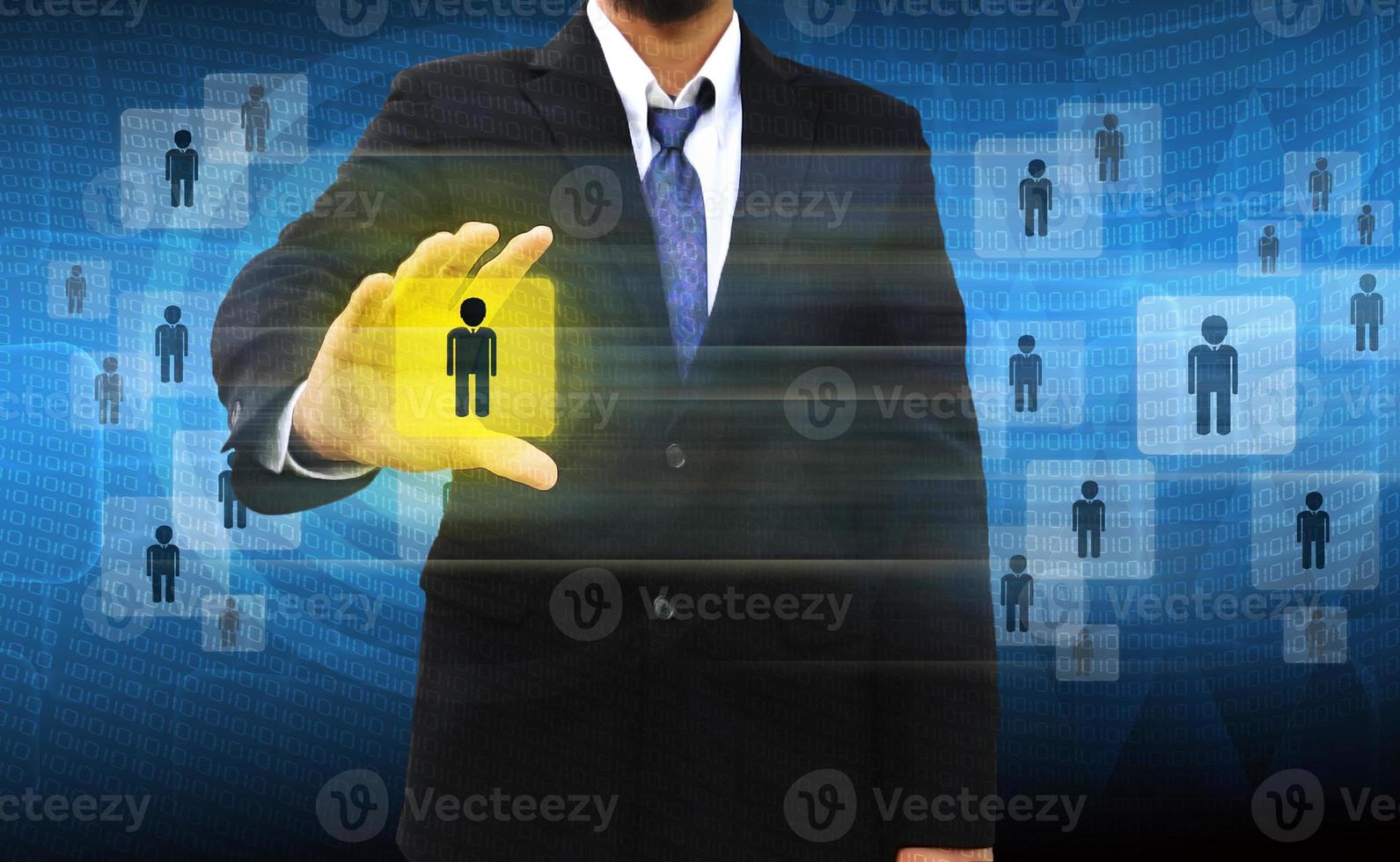 Choosing the right person on a group of business people photo