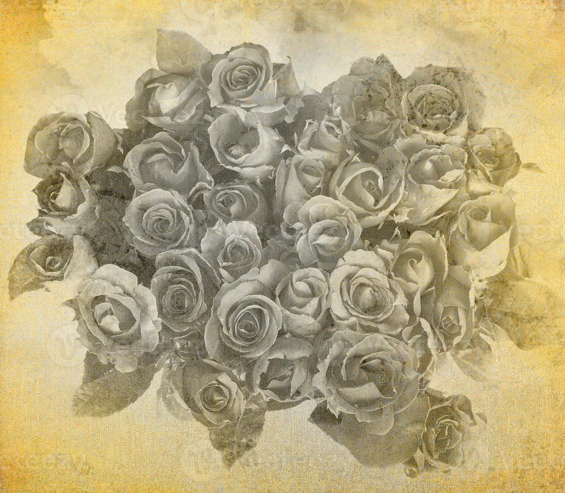 ramo de rosas en la textura antigua y el fondo foto