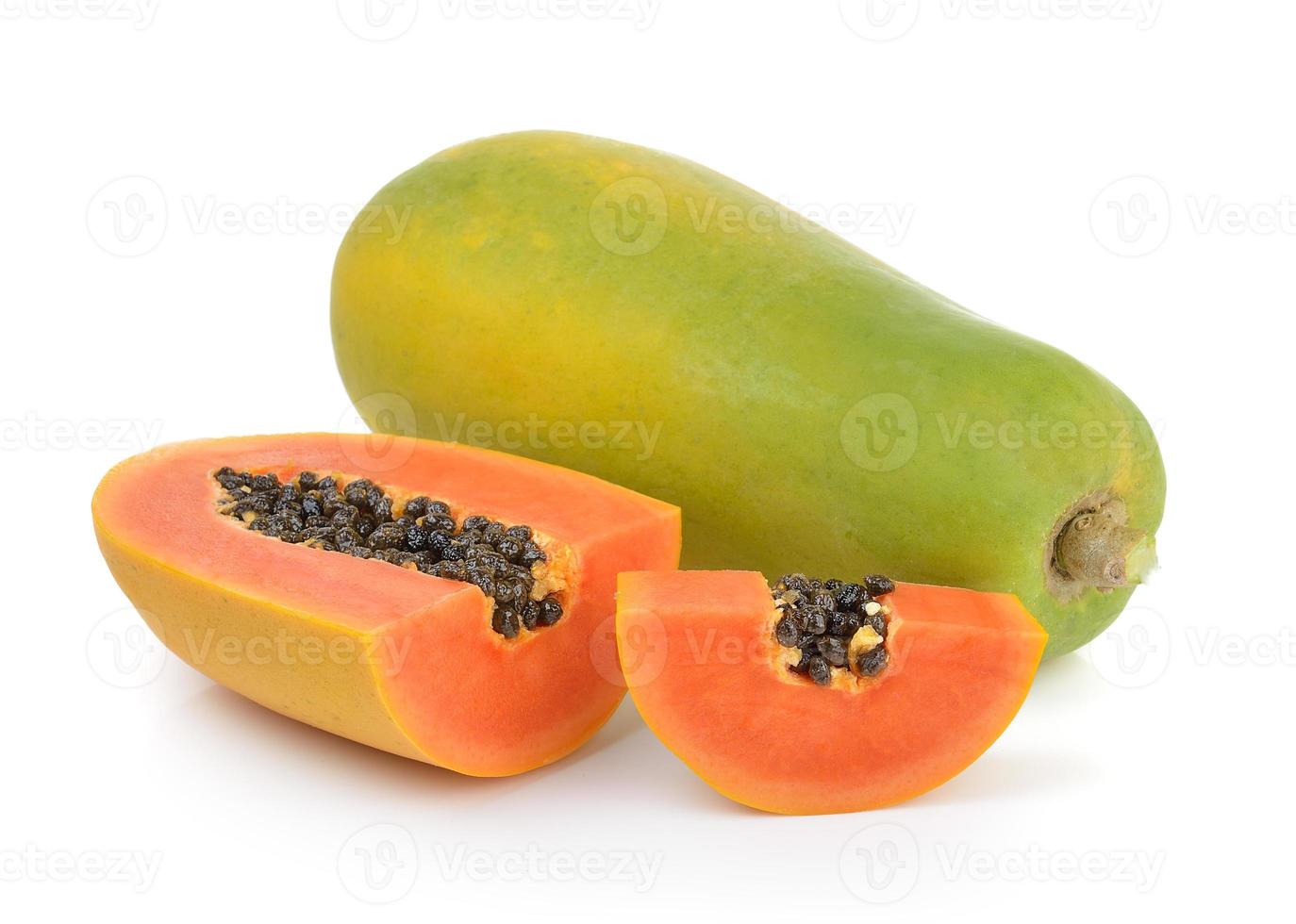 ripe papaya on white background photo
