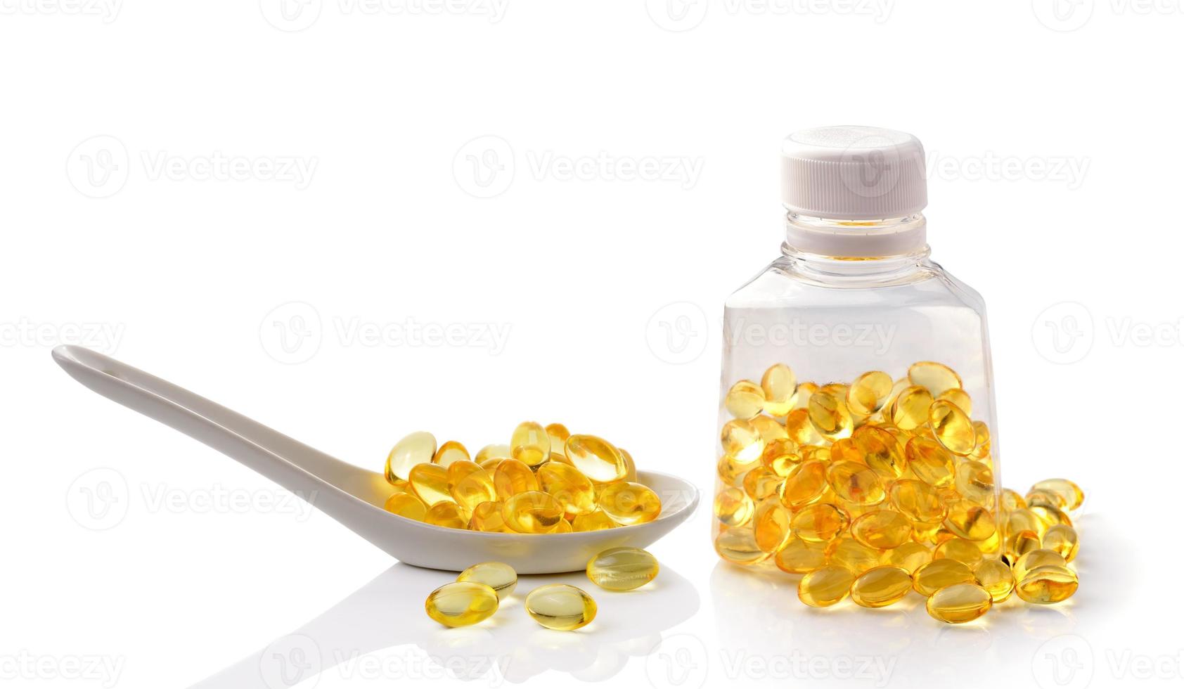 Fish oil pill on white background photo