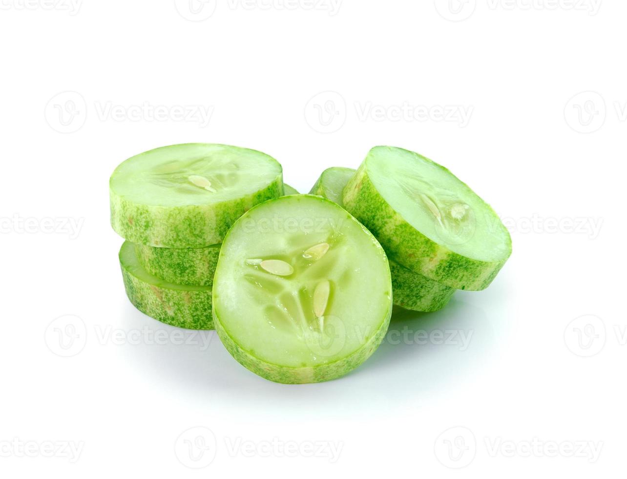 Fresh cucumber slice isolated on white background photo