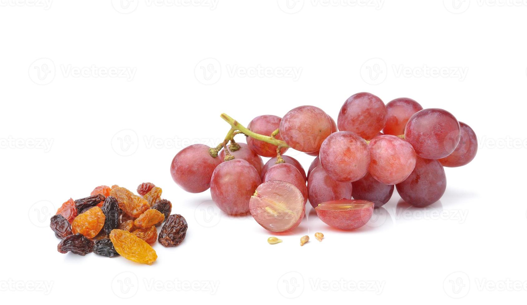 Grapes with raisins isolated on white background photo