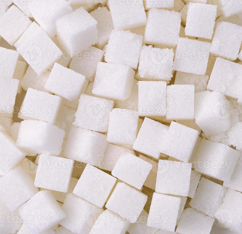 Refined sugar cubes background photo