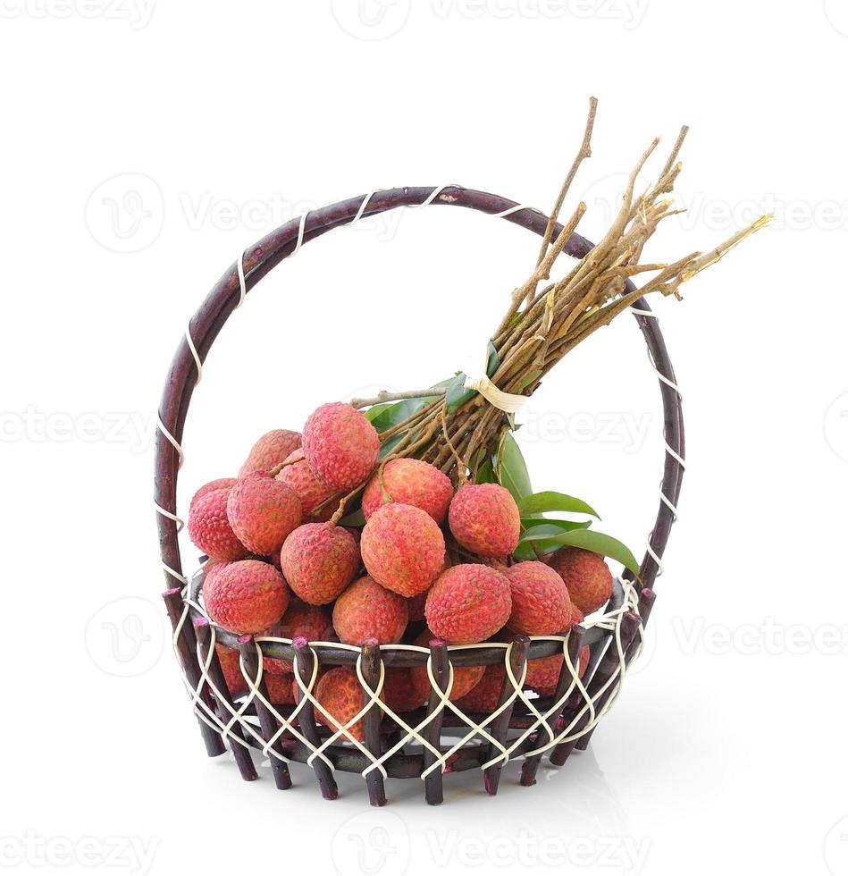 Fresh lychee fruit in basket isolated on white background photo