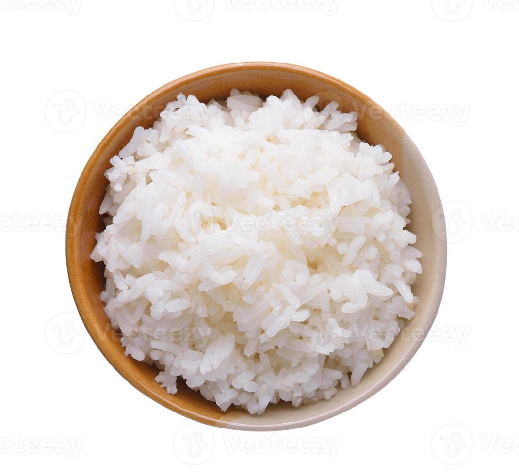 Rice in a bowl isolated on a white background photo