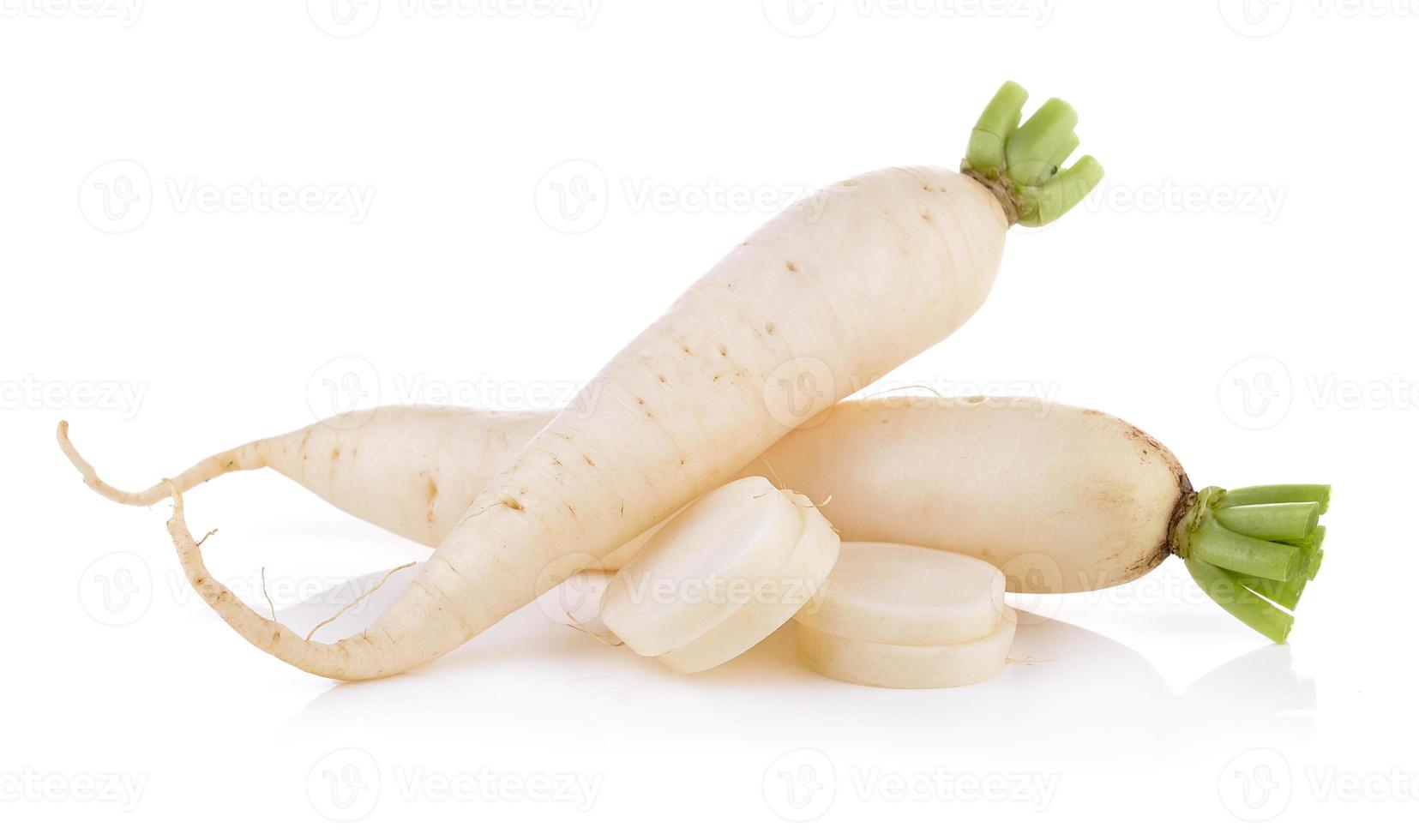 Daikon radishes isolated on white background photo