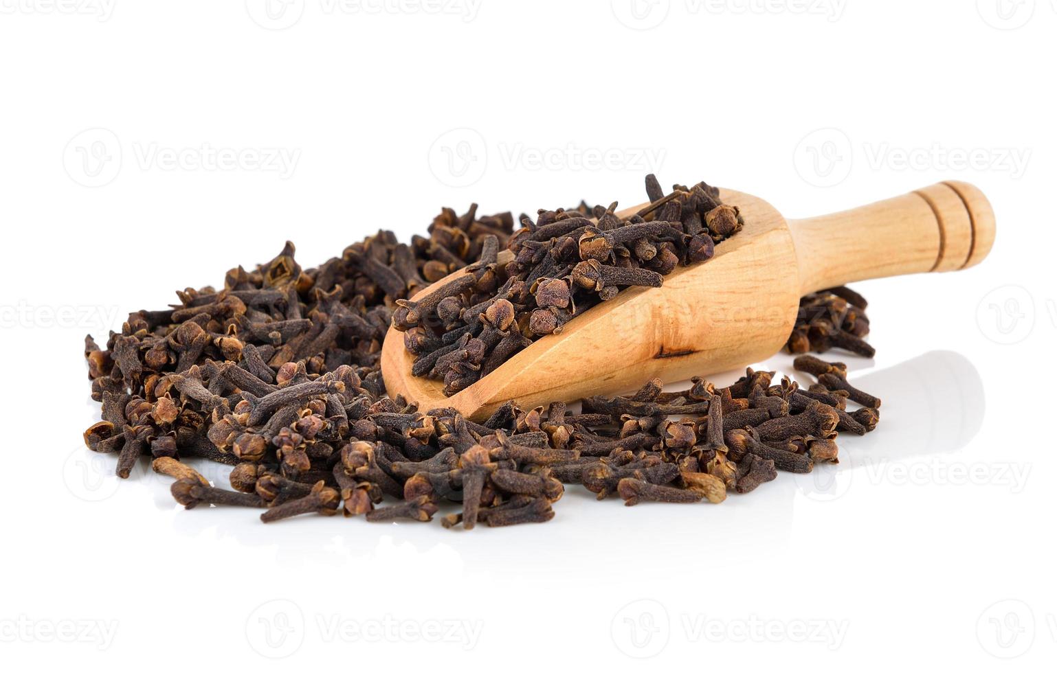 Spice cloves on white background photo