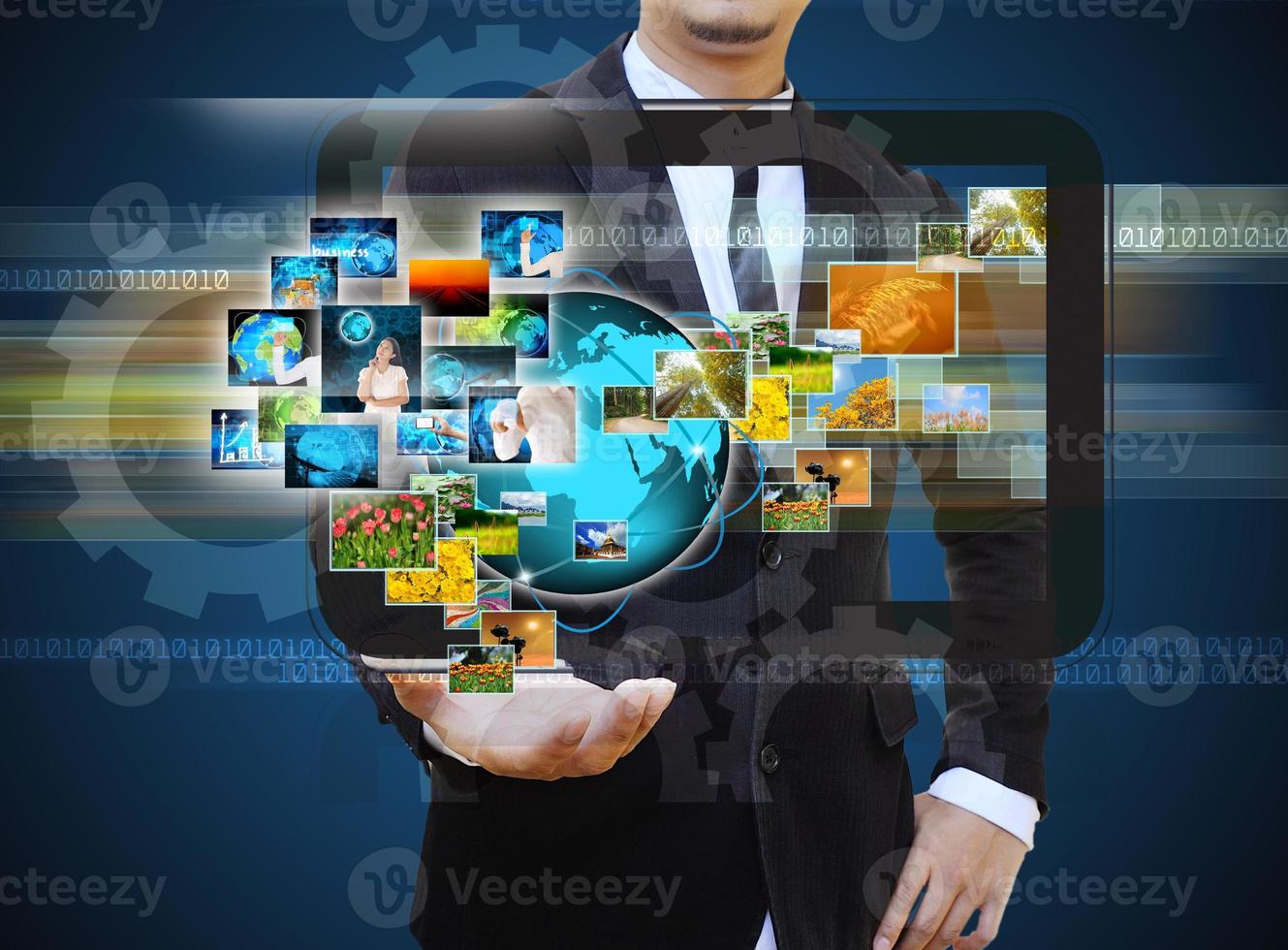 businessman holding Reaching images streaming in hands .Financial and technologies concepts photo