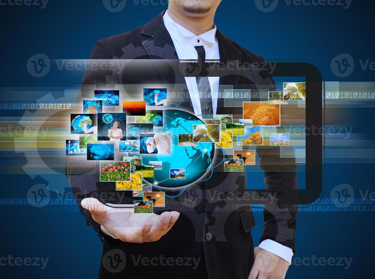 Businessman holding business collection photo