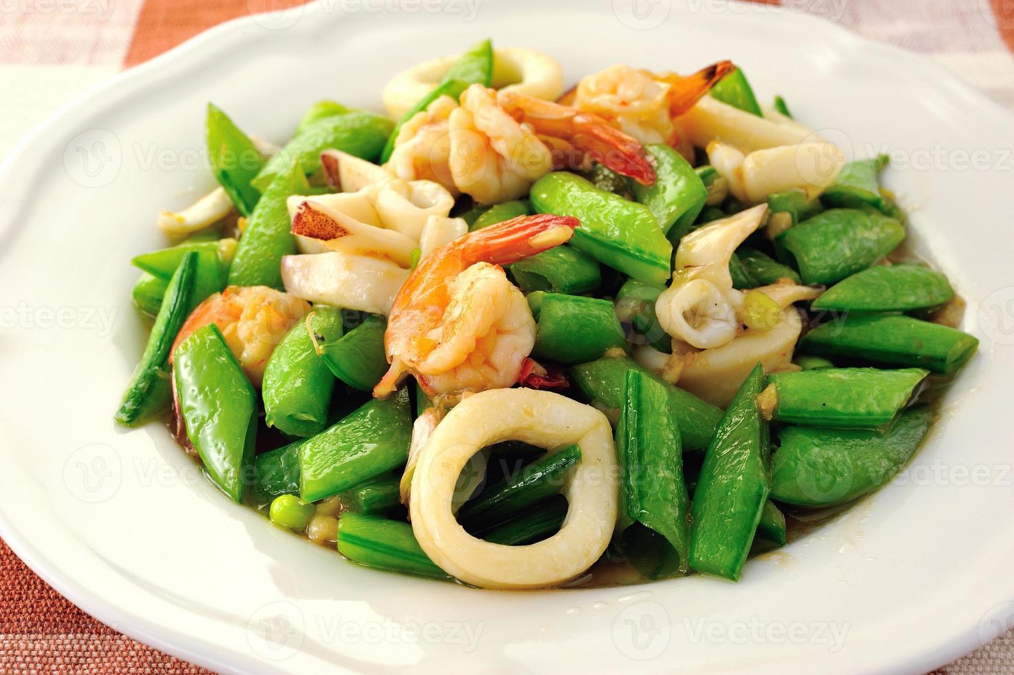 Seafoods - Shrimps,  Squids with green peas photo