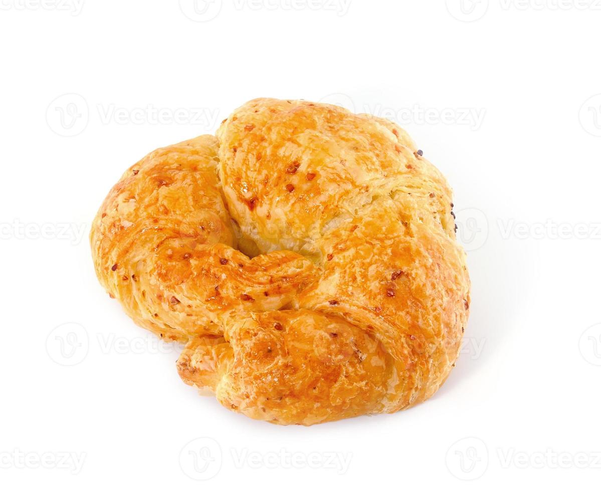 Fresh and tasty croissant over white background photo