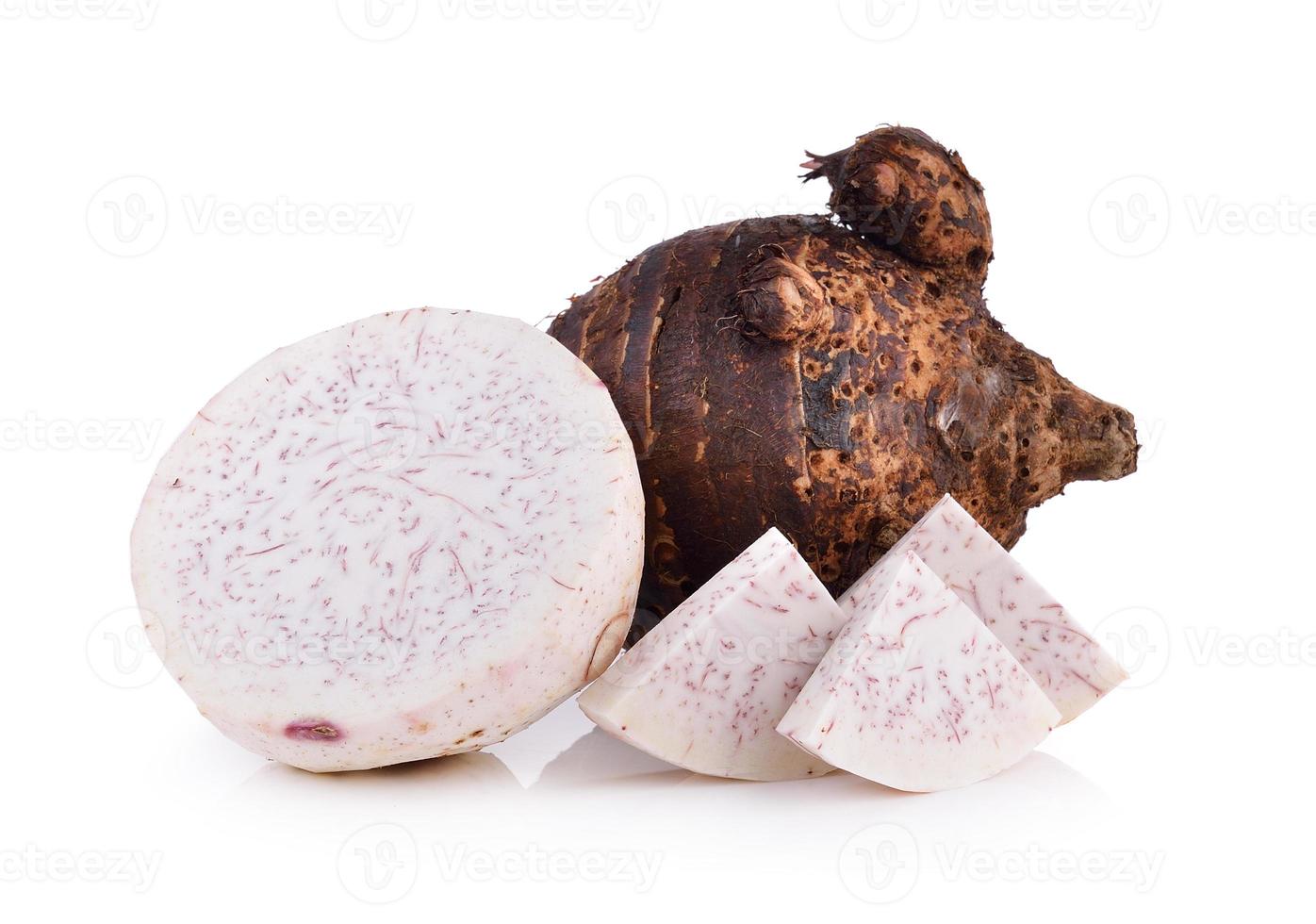 taro roots on white background photo
