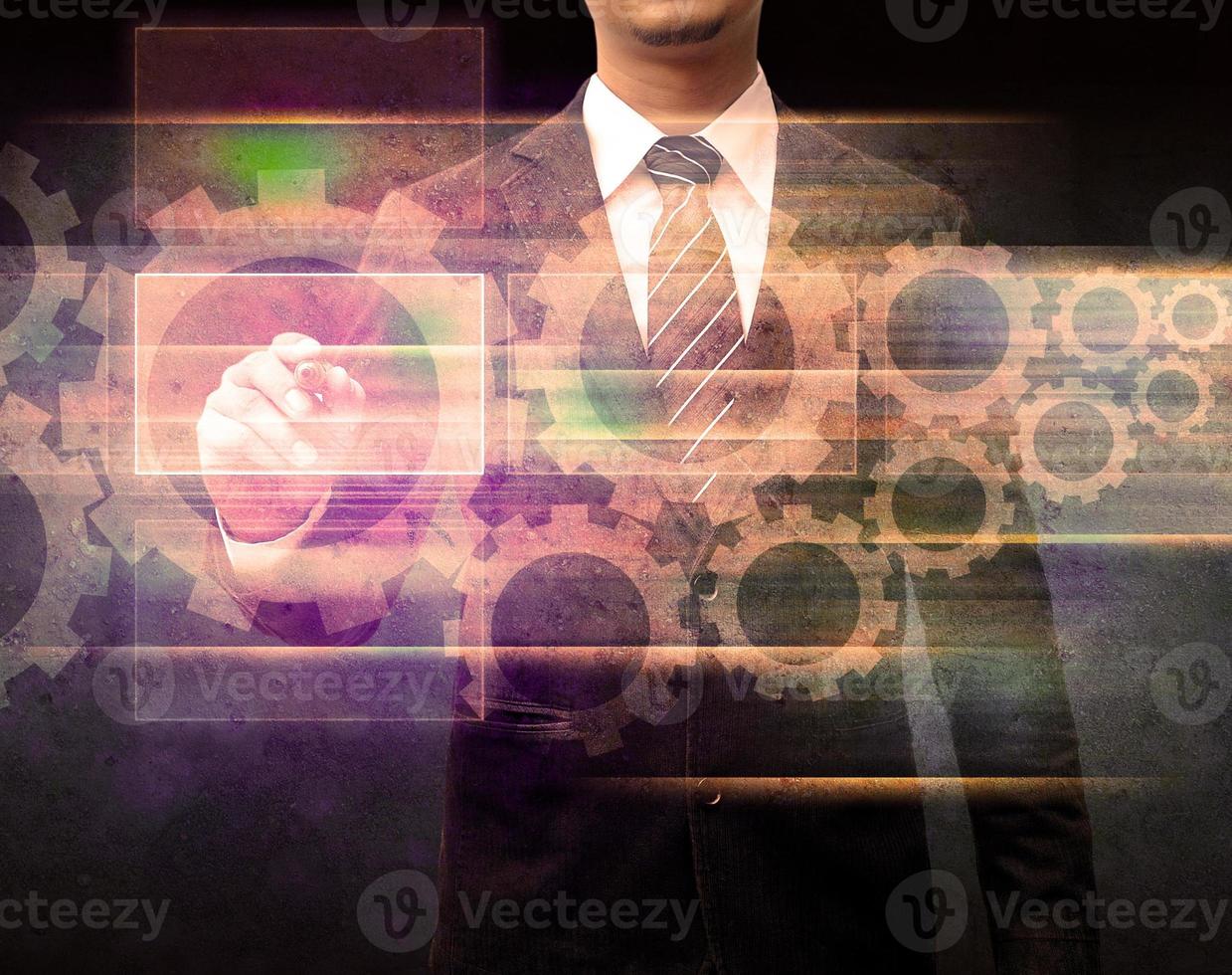 Businessman writing on the screen in the old background photo