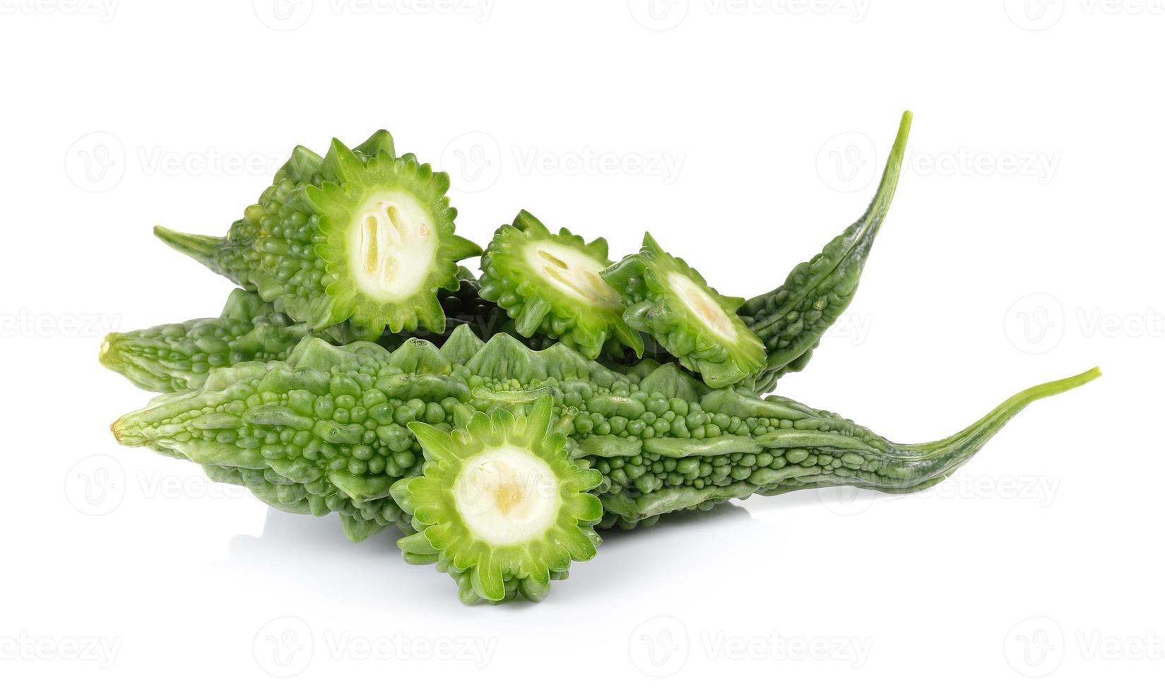 Bitter melon slices isolated on white background photo