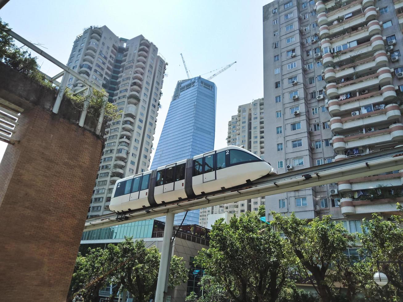 City train and buildings in Shenzhen city, China photo